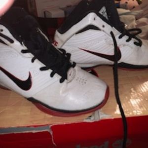 Slightly used nike shoes size 3 red black and white